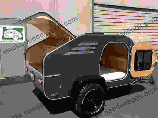 A Gleaming Teardrop Trailer Stands Ready For Adventure, Adorned With Windows, A Door, And A Protective Exterior Coating. Building Teardrop Trailer : Step By Step Guide To Build Your Teardrop Trailer