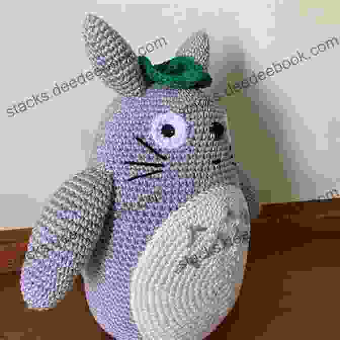 A Gray Totoro Amigurumi With Big Eyes And A Friendly Face. Knitting Mochimochi: 20 Super Cute Strange Designs For Knitted Amigurumi