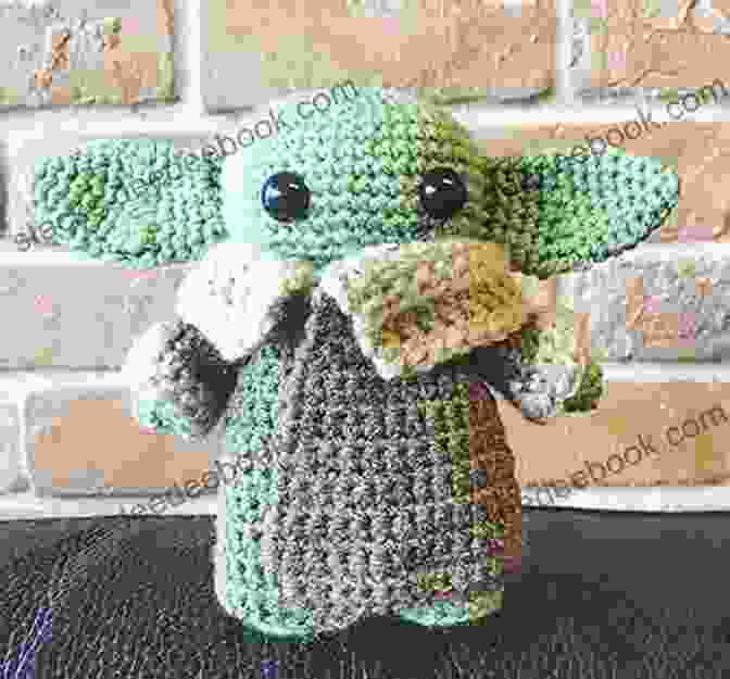 A Green Baby Yoda Amigurumi With Big Eyes And A Wrinkly Face. Knitting Mochimochi: 20 Super Cute Strange Designs For Knitted Amigurumi