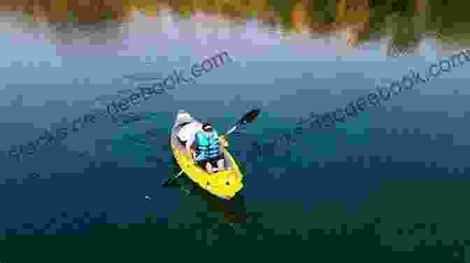 A Kayaker Paddling Through The Tranquil Waters Of St. Joseph Bay In Nick Russell Overlooked Florida Nick Russell