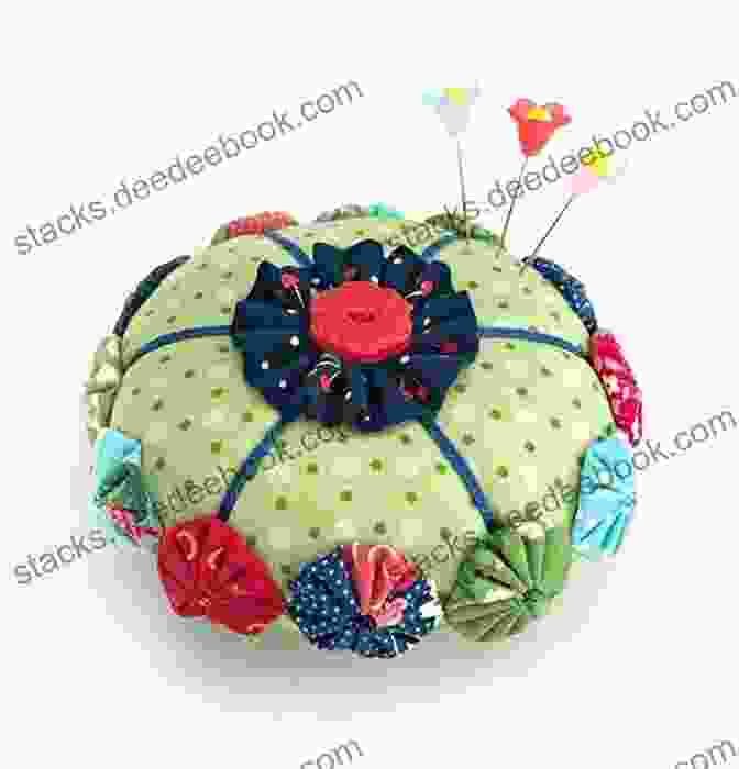 A Round Pincushion Made From A Floral Fabric, With A Ribbon Bow On Top Make Pincushions: 12 Darling Projects To Sew