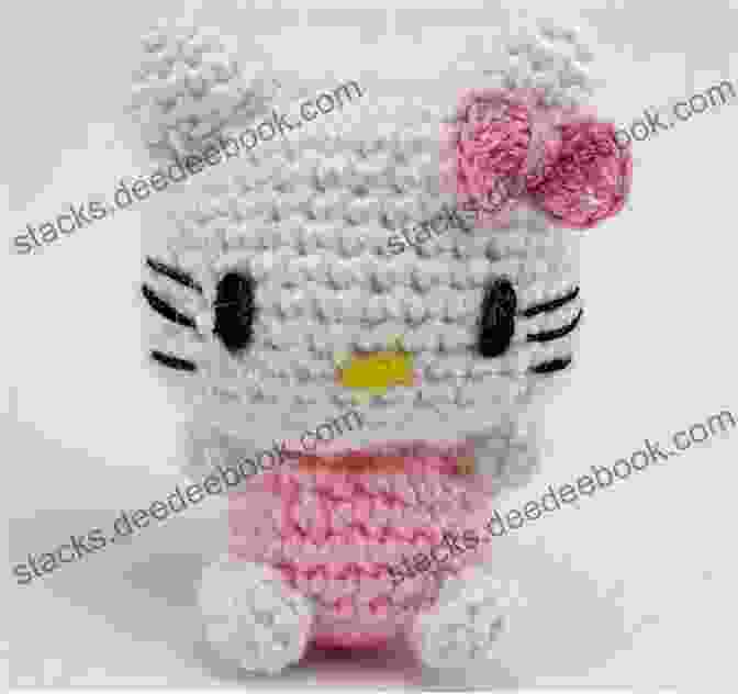 A White Hello Kitty Amigurumi With A Pink Bow And A Cute Face. Knitting Mochimochi: 20 Super Cute Strange Designs For Knitted Amigurumi
